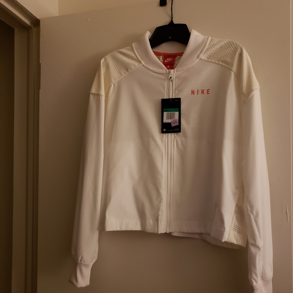 Brand new NIKE WOMEN'S WHITE JACKET SIZE XL